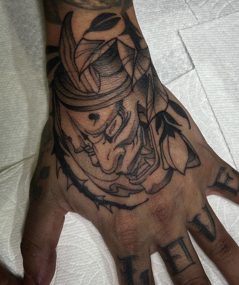 Photo of Guru Tattoo