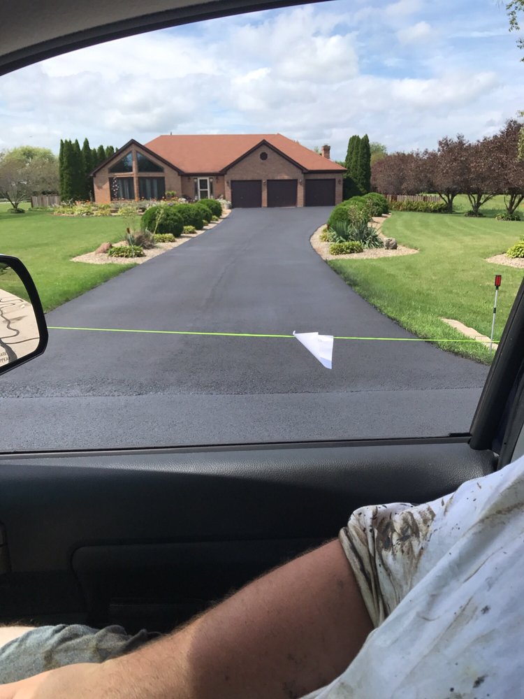 Photo of Tan drive way sealcoating