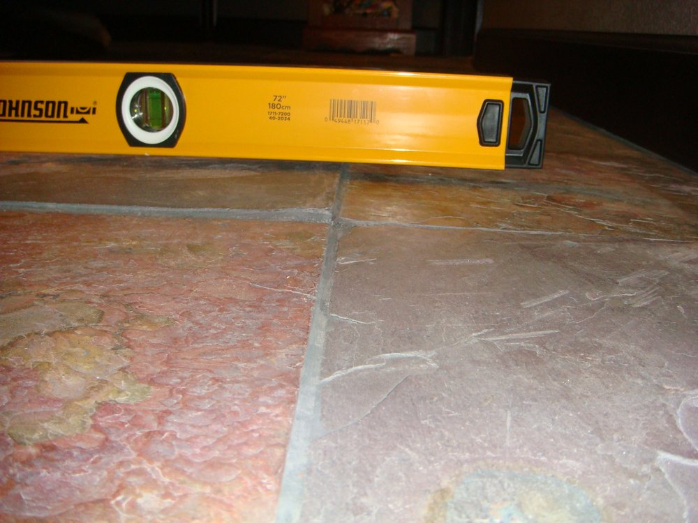 Photo of Red Oval Floor Care