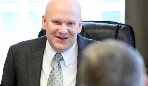 Photo of Paul Benson Attorney at Law overwhelmed with debt because of an illness, divorce