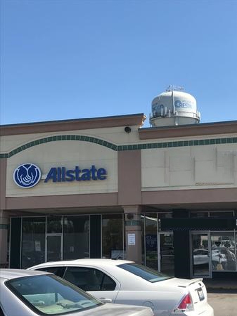 Photo of Tim Todd: Allstate Insurance selling products and servicing clients in 1980s