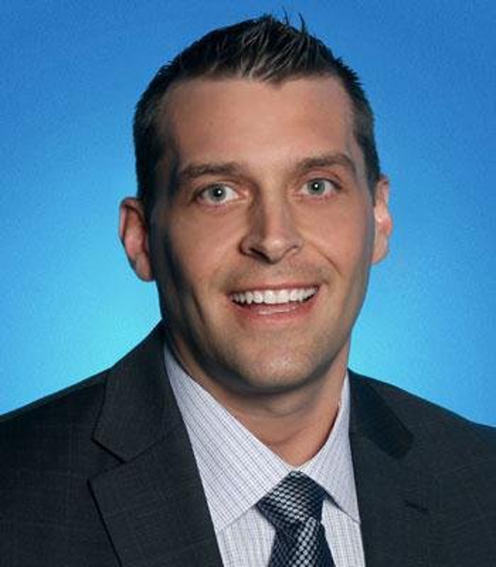 Photo of Frank A Lengal Jr: Allstate Insurance attending the university's sporting events