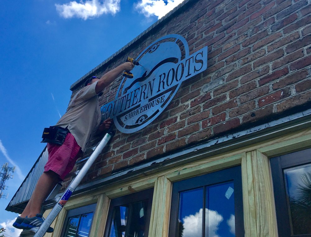 Photo of Rise Above Sign & Graphics