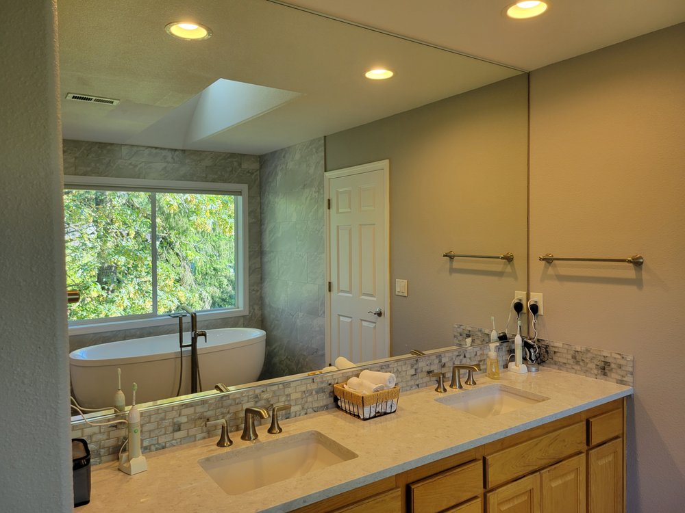 Photo of Elegant Tile and Hardwood Floors
