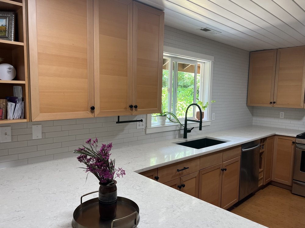 Photo of Elegant Tile and Hardwood Floors