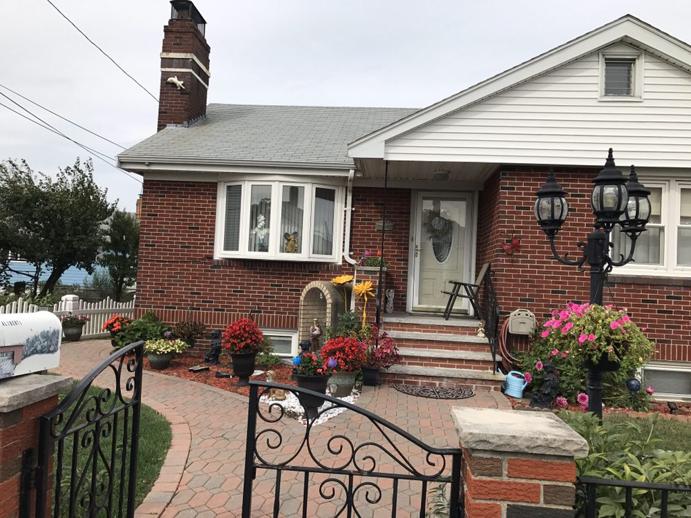 Photo of Torri Gutters & Painting