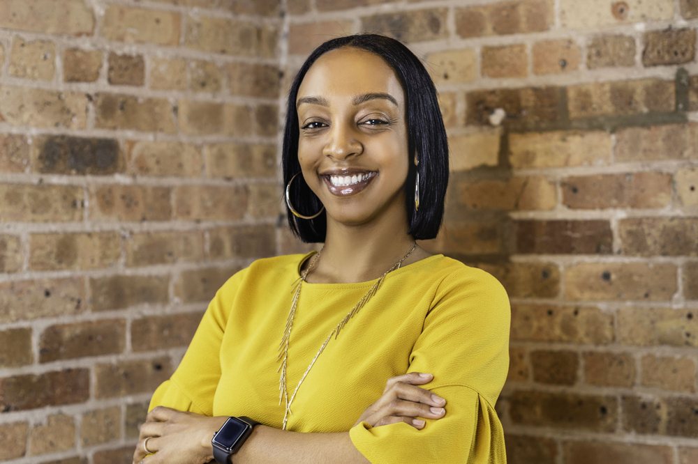 Photo of Dominique Poindexter - Carmarc Realty