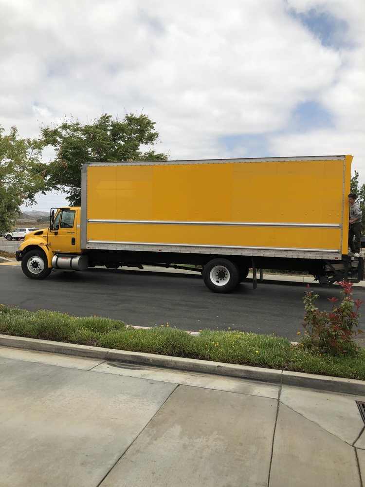 Photo of A Guy and His Truck Moving