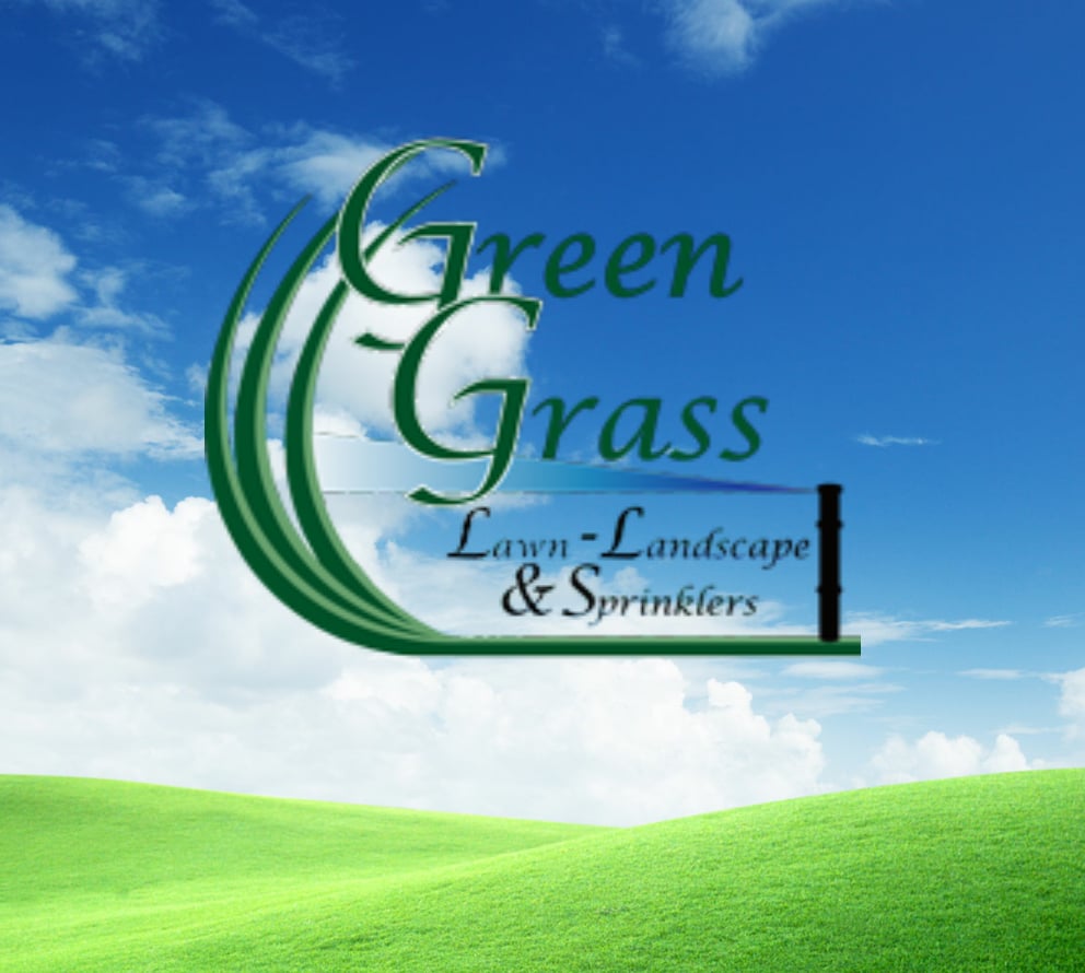 Photo of Green Grass Lawn & Sprinklers