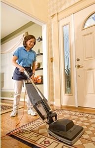 Photo of Lady In White House Cleaning Service