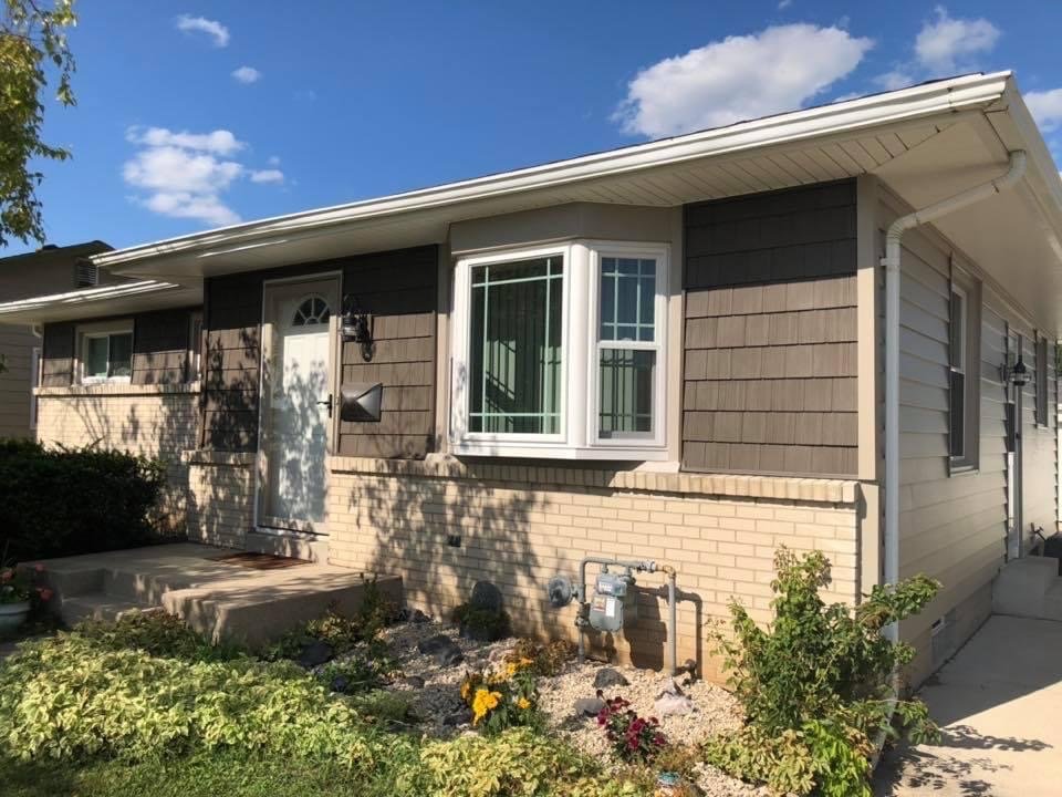 Photo of Replacement Window Center and Exteriors