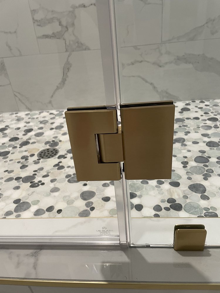 Photo of Artistic shower door glass railings