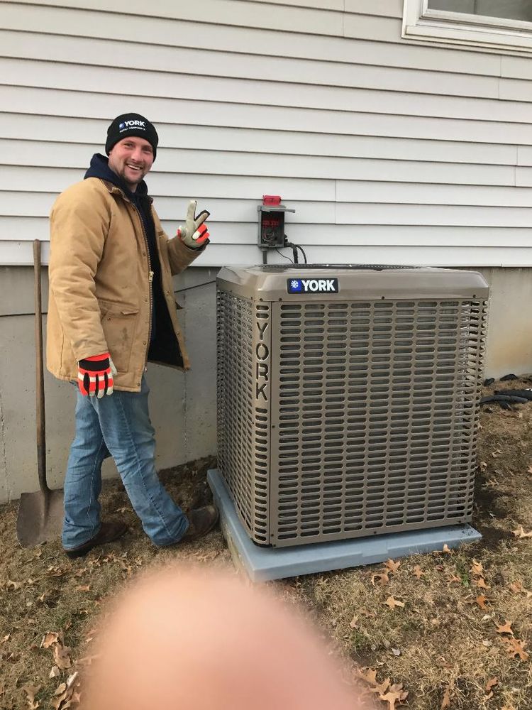 Photo of Rhodes Heating Cooling Plumbing And Rooter