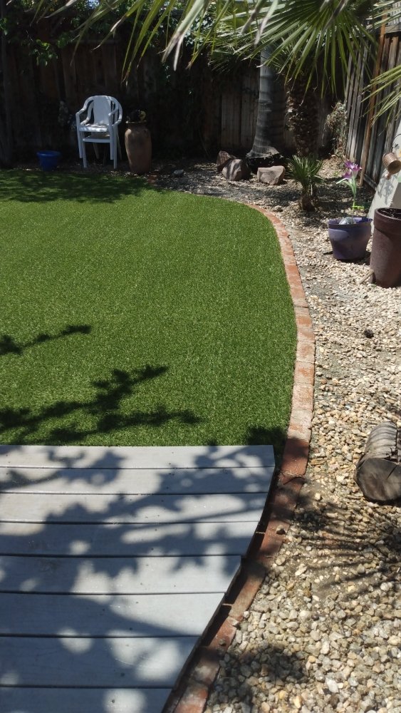 Photo of JD's construction and synthetic grass