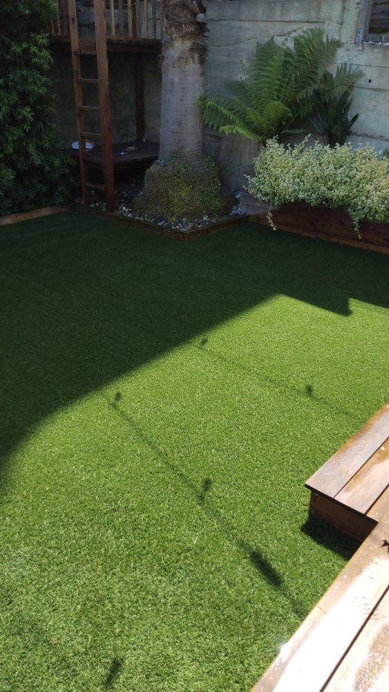 Photo of JD's construction and synthetic grass