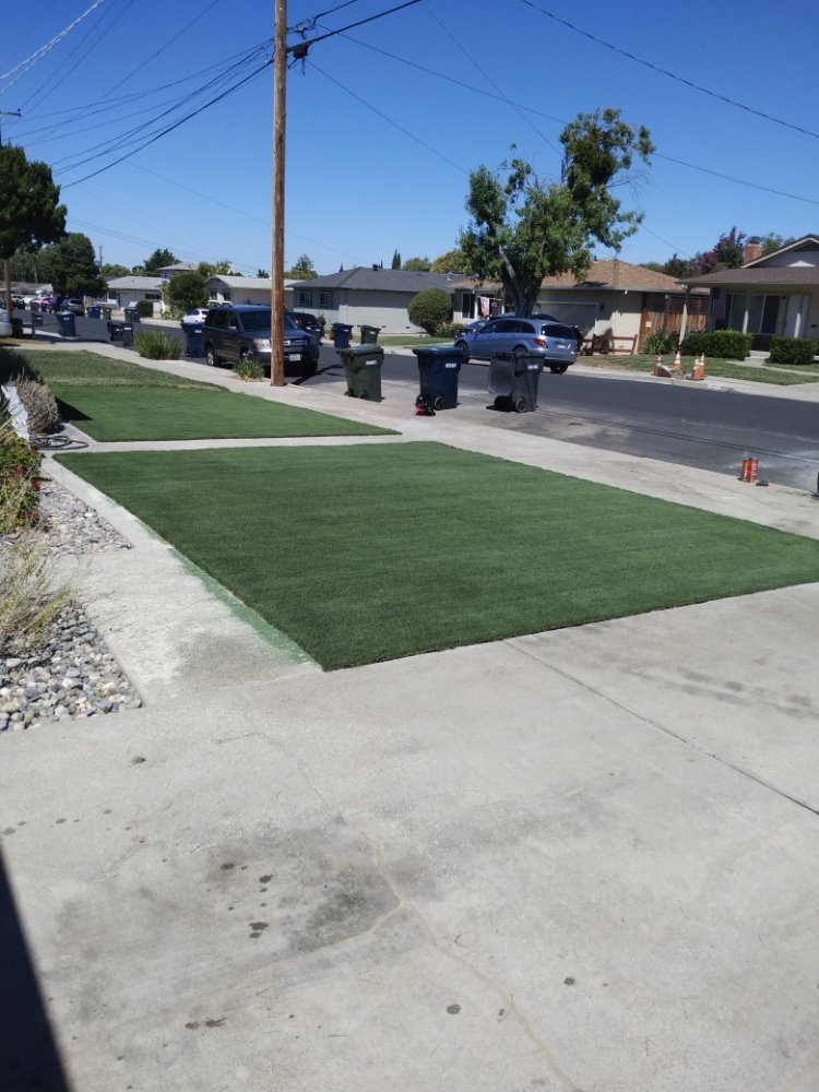 Photo of JD's construction and synthetic grass