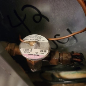 Photo of 2 Conditions Heating Air and Garage Door