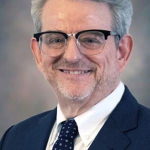Photo of Tim Todd: Allstate Insurance selling products and servicing clients in 1980s