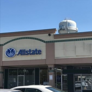 Photo of Tim Todd: Allstate Insurance selling products and servicing clients in 1980s