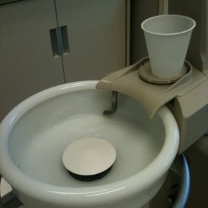 Photo of Pi Dental Center Providing Our Dental Patients