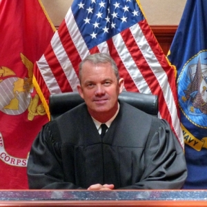 Photo of King Military Law serving on active duty for 30 years