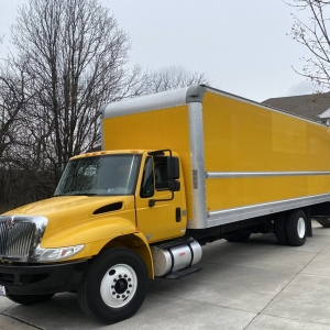 Photo of Yellow Truck Moving and Junk Hauling