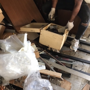 Photo of His & Hers Hauling Trash Removal