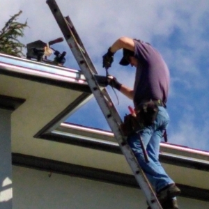 Photo of Jenks Gutters and Downspouts