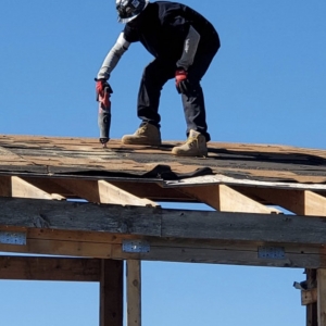 Photo of 2 Men and a Hammer