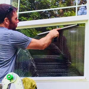 Photo of Family Man Window Cleaning