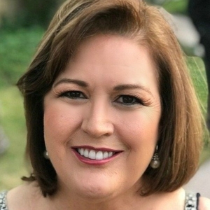Photo of Gloria De La Vara - OnQ Financial