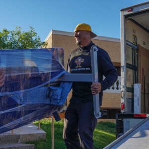 Photo of Muscular Moving Men and Storage