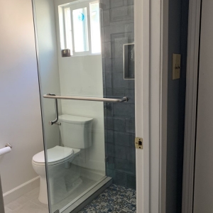 Photo of Artistic shower door glass railings